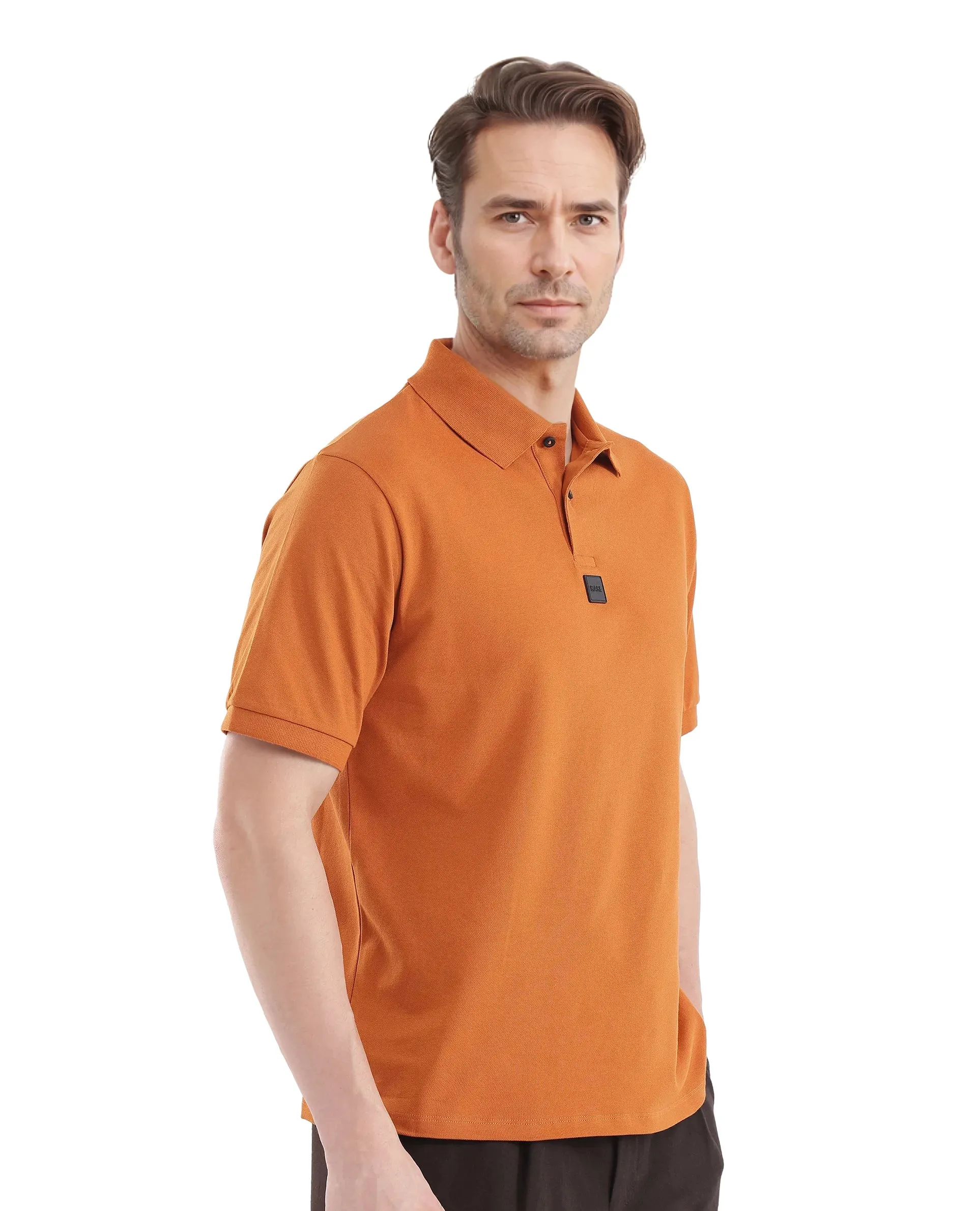 Rare Rabbit Men Mabe Orange Short Sleeve Regular Collar Silicone Badge Branding Flat Knit Plain Polo